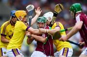 4 July 2018; Evan Niland of Galway in action against Damien Reck, left, and Rory O'Connor of Wexford during the Bord Gais Energy Leinster Under 21 Hurling Championship 2018 Final match between Wexford and Galway at O'Moore Park in Portlaoise, Co Laois. Photo by Sam Barnes/Sportsfile