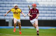 4 July 2018; Tomas Monaghan of Galway in action against Rowan White of Wexford during the Bord Gais Energy Leinster Under 21 Hurling Championship 2018 Final match between Wexford and Galway at O'Moore Park in Portlaoise, Co Laois. Photo by Sam Barnes/Sportsfile