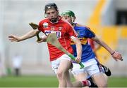 4 July 2018; Jack O'Connor of Cork in action against Brian McGrath of Tipperary during the Bord Gáis Energy Munster GAA Hurling U21 Championship Final match between Cork and Tipperary at Pairc Ui Chaoimh in Cork. Photo by Matt Browne/Sportsfile