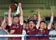 4 July 2018; Galway captain Fintan Burke lifts the trophy after with teammates, from left, Darragh Gilligan, Jack Fitzpatrick and Conor Caulfield after the Bord Gais Energy Leinster Under 21 Hurling Championship 2018 Final match between Wexford and Galway at O'Moore Park in Portlaoise, Co Laois. Photo by Harry Murphy/Sportsfile