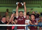 4 July 2018; Galway captain Fintian Burke lifts the trophy after with teammates, from left, Darragh Gilligan and Jack Fitzpatrick after the Bord Gais Energy Leinster Under 21 Hurling Championship 2018 Final match between Wexford and Galway at O'Moore Park in Portlaoise, Co Laois. Photo by Harry Murphy/Sportsfile