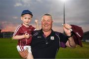 4 July 2018; Galway manager Tony Ward with his grandson Oisin Hallabert, aged 4, after the Bord Gais Energy Leinster Under 21 Hurling Championship 2018 Final match between Wexford and Galway at O'Moore Park in Portlaoise, Co Laois. Photo by Harry Murphy/Sportsfile
