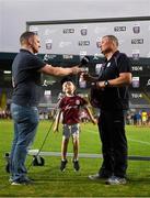 4 July 2018; Oisin Hallabert, aged 4, grandson of  Galway manager Tony Ward during an interview with Marcus Ó Buachalla after the Bord Gais Energy Leinster Under 21 Hurling Championship 2018 Final match between Wexford and Galway at O'Moore Park in Portlaoise, Co Laois. Photo by Harry Murphy/Sportsfile