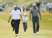 6 July 2018; Shane Lowry, left, of Ireland and Lee Westwood of England chat on the 15th fairway during Day Two of the Dubai Duty Free Irish Open Golf Championship at Ballyliffin Golf Club in Ballyliffin, Co. Donegal. Photo by Ramsey Cardy/Sportsfile