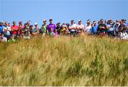 6 July 2018; Members of the gallery watch on as Rory McIlroy of Northern Ireland tees off at the 7th hole during Day Two of the Dubai Duty Free Irish Open Golf Championship at Ballyliffin Golf Club in Ballyliffin, Co. Donegal. Photo by Ramsey Cardy/Sportsfile