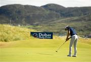 6 July 2018; Jinho Choi of South Korea putts on the 10th green during Day Two of the Dubai Duty Free Irish Open Golf Championship at Ballyliffin Golf Club in Ballyliffin, Co. Donegal.  Photo by Ramsey Cardy/Sportsfile