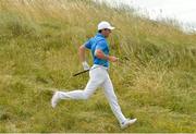 7 July 2018; Rory McIlroy of Northern Ireland runs through the rough at the 1st hole during Day Three of the Dubai Duty Free Irish Open Golf Championship at Ballyliffin Golf Club in Ballyliffin, Co. Donegal. Photo by Oliver McVeigh/Sportsfile
