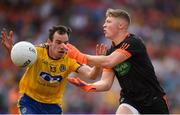 7 July 2018; Blaine Hughes of Armagh in action against Niall Kilroy of Roscommon during the GAA Football All-Ireland Senior Championship Round 4 match between Roscommon and Armagh at O’Moore Park in Portlaoise, Co. Laois. Photo by Eóin Noonan/Sportsfile