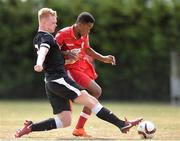 7 July 2018; Aidomo Emakhu of Shelbourne against Oran McGrath of Finn Harps during the SSE Airticity National U15 League match between Shelbourne and Finn Harps at the AUL in Clonshaugh, Co. Dublin. Photo by Eoin Smith/Sportsfile