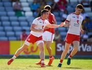 7 July 2018; Connor McAliskey of Tyrone, centre, celebrates after scoring his side's first goal during the GAA Football All-Ireland Senior Championship Round 4 between Cork and Tyrone at O’Moore Park in Portlaoise, Co. Laois. Photo by Brendan Moran/Sportsfile