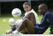 18 August 2003; Clinton Morrison and John O'Shea of Republic of Ireland pictured during Republic of Ireland soccer training at Tolka Rovers FC in Griffith Avenue, Dublin. Photo by Damien Eagers/Sportsfile