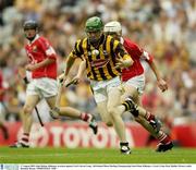 17 August 2003; John Dalton of Kilkenny, in action against Kevin Canty of Cork during the All-Ireland Minor Hurling Championship Semi-Final between Kilkenny and Cork at Croke Park in Dublin. Photo by Brendan Moran/Sportsfile