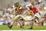 17 August 2003; John Dalton of Kilkenny, in action against Kevin Canty of Cork during the All-Ireland Minor Hurling Championship Semi-Final between Kilkenny and Cork at Croke Park in Dublin. Photo by Brendan Moran/Sportsfile