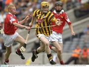 17 August 2003; Richie Power of Kilkenny, in action against Brian Clifford, left, and Michael Aherne of Cork during the All-Ireland Minor Hurling Championship Semi-Final between Kilkenny and Cork at Croke Park in Dublin. Photo by Ray McManus/Sportsfile