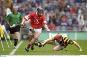 17 August 2003; Maurice O'Sullivan of Cork, in action against Peter O'Donovan of Kilkenny during the All-Ireland Minor Hurling Championship Semi-Final between Kilkenny and Cork at Croke Park in Dublin. Photo by Ray McManus/Sportsfile