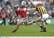 17 August 2003; Maurice O'Sullivan of Cork, in action against Peter O'Donovan of Kilkenny during the All-Ireland Minor Hurling Championship Semi-Final between Kilkenny and Cork at Croke Park in Dublin. Photo by Ray McManus/Sportsfile