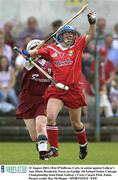 23 August 2003; Orla O'Sullivan of Cork, in action against Galway's Ann Marie Broderick during the Foras na Gaeilge All-Ireland Senior Camogie Championship Semi-Final between Galway and Cork at Cusack Park, Ennis. Photo by Ray McManus/Sportsfile
