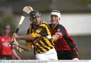 23 August 2003; Conor Phelan, Kilkenny, in action against Down's Gareth Johnson during the All-Ireland U-21 Hurling Championship Semi-Final between Kilkenny and Down at Cusack Park, Mullingar, Westmeath. Photo by Matt Browne/Sportsfile