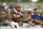 23 August 2003; Fergal Moore, Galway, in action against Tipperary's Eoin Kelly during the All-Ireland U-21 Hurling Championship Semi-Final between Galway and Tipperary at Cusack Park, Ennis. Photo by Ray McManus/Sportsfile