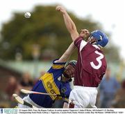 23 August 2003; Tony Og Regan, Galway, in action against Tipperary's John O'Brien during the All-Ireland U-21 Hurling Championship Semi-Final between Galway and Tipperary at Cusack Park, Ennis. Photo by Ray McManus/Sportsfile