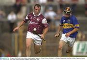 23 August 2003; David Greene, Galway, in action against Tipperary's Michael Phelan during the All-Ireland U-21 Hurling Championship Semi-Final between Galway and Tipperary at Cusack Park, Ennis. Photo by Ray McManus/Sportsfile