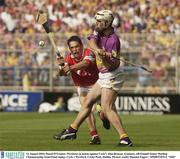 16 August 2003; David O'Connor, Wexford, in action against Cork's Alan Browne during the Guinness All-Ireland Senior Hurling Championship Semi-Final replay between Cork and Wexford at Croke Park, Dublin. Photo by Damien Eagers/Sportsfile