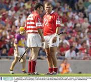 16 August 2003; Cork's Diarmuid O'Sullivan speaks to his goalkeeper, Donal Og Cusack during the Guinness All-Ireland Senior Hurling Championship Semi-Final replay between Cork and Wexford at Croke Park, Dublin. Photo by Damien Eagers/Sportsfile