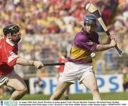 16 August 2003; Rory Jacob, Wexford, in action against Cork's Wayne Sherlock during the Guinness All-Ireland Senior Hurling Championship Semi-Final replay between Cork and Wexford at Croke Park, Dublin. Photo by Damien Eagers/Sportsfile