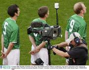 19 August 2003; Gary Breen, left, Matt Holland, centre, and Gary Doherty are filmed by a Sky Sports cameraman as they stand for the natiopnal anthem before an International Friendly between Republic of Ireland and Australia at Lansdowne Road, Dublin. Photo by Damien Eagers/Sportsfile