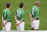 19 August 2003; Steve Finnan, left, Robbie Keane, centre, and Stephen Carr of Republic of Ireland stand for the national anthem during an International Friendly between Republic of Ireland and Australia at Lansdowne Road, Dublin. Photo by Damien Eagers/Sportsfile