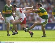 24 August 2003; Brian Dooher of Tyrone, in action against John Sheehan of Kerry during the Bank of Ireland All-Ireland Senior Football Championship Semi-Final between Tyrone and Kerry at Croke Park, Dublin. Photo by Damien Eagers/Sportsfile