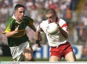 24 August 2003; Philip Jordan of Tyrone, in action against Declan O'Sullivan of Kerry during the Bank of Ireland All-Ireland Senior Football Championship Semi-Final between Tyrone and Kerry at Croke Park, Dublin. Photo by Matt Browne/Sportsfile