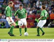 19 August 2003; Gary Doherty, left, Mark Kinsella, centre, and David Connolly of Republic of Ireland restart the match after conceeding a goal during an International Friendly between Republic of Ireland and Australia at Lansdowne Road, Dublin.  Photo by Damien Eagers/Sportsfile