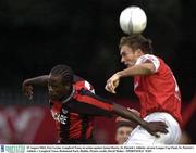 25 August 2003; Eric Levine of Longford Town, in action against Jamie Harris of St. Patrick's Athletic during the Eircom League Cup Final between St. Patrick's Athletic and Longford Town at Richmond Park, Dublin. Photo by David Maher/Sportsfile