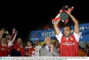 25 August 2003; Paul Osam captain of St. Patrick's Athletic, celebrates at the end of the game after victory over Longford Town in the Eircom League Cup Final between St. Patrick's Athletic and Longford Town at Richmond Park, Dublin. Photo by David Maher/Sportsfile