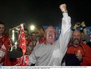 25 August 2003; Eamon Collins, St. Patrick's Athletic manager, celebrates at the end of the game after victory over Longford Town after the eircom League Cup Final between St. Patrick's Athletic and Longford Town at Richmond Park, Dublin. Photo by David Maher/Sportsfile