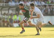 30 June 2018; Kevin McLoughlin of Mayo in action against Kevin Flynn of Kildare during the GAA Football All-Ireland Senior Championship Round 3 match between Kildare and Mayo at St Conleth's Park in Newbridge, Kildare. Photo by Piaras Ó Mídheach/Sportsfile