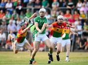 7 July 2018; Kyle Hayes of Limerick  scores a goal past Diarmuid Byrne, left, and Kevin McDonald of Carlow during the GAA Hurling All-Ireland Senior Championship Preliminary Quarter-Final match between Carlow and Limerick at Netwatch Cullen Park in Carlow. Photo by Matt Browne/Sportsfile