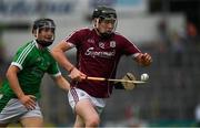 8 July 2018; Oisín Flannery of Galway in action against Padraig Harnett of Limerick during the Electric Ireland GAA Hurling All-Ireland Minor Championship Quarter-Final match between Galway and Limerick at Semple Stadium in Thurles, Co Tipperary. Photo by Ray McManus/Sportsfile