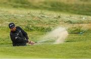 8 July 2018; Shane Lowry of Ireland plays a shot out of a bunker on the 11th hole during Day Four of the Dubai Duty Free Irish Open Golf Championship at Ballyliffin Golf Club in Ballyliffin, Co. Donegal.