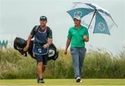 8 July 2018; Paul Dunne of Ireland, right, and his caddie Darren Reynolds leave the 11th tee box during Day Four of the Dubai Duty Free Irish Open Golf Championship at Ballyliffin Golf Club in Ballyliffin, Co. Donegal. Photo by John Dickson/Sportsfile