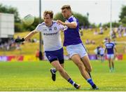 8 July 2018; Jack McCarron of Monaghan in action against Colm Begley of Laois during the GAA Football All-Ireland Senior Championship Round 4 match between Laois and Monaghan at Páirc Tailteann in Navan, Co Meath. Photo by Ramsey Cardy/Sportsfile