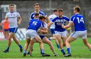 8 July 2018; Niall Kearns of Monaghan is tackled by Trevor Collins of Laois during the GAA Football All-Ireland Senior Championship Round 4 match between Laois and Monaghan at Páirc Tailteann in Navan, Co Meath. Photo by Ramsey Cardy/Sportsfile