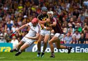 8 July 2018; Ger Aylward of Kilkenny squeezes past Galway goalkeeper James Skehill, left, and Gearóid McInerney of Galway on his way to score a goal inthe 34th minute during the Leinster GAA Hurling Senior Championship Final Replay match between Kilkenny and Galway at Semple Stadium in Thurles, Co Tipperary. Photo by Ray McManus/Sportsfile