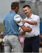 8 July 2018; Russell Knox of Scotland is congratulated by Raphaël Jacquelin of France after winning the Dubai Duty Free Irish Open during Day Four of the Dubai Duty Free Irish Open Golf Championship at Ballyliffin Golf Club in Ballyliffin, Co. Donegal. Photo by Oliver McVeigh/Sportsfile