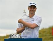 8 July 2018; Russell Knox of Scotland with the Dubai Duty Free Irish Open trophy on the 18th green after Day Four of the Dubai Duty Free Irish Open Golf Championship at Ballyliffin Golf Club in Ballyliffin, Co. Donegal. Photo by Oliver McVeigh/Sportsfile