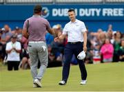 8 July 2018; Russell Knox of Scotland is congratulated by Ryan Fox after he won the play-off hole on Day Four of the Dubai Duty Free Irish Open Golf Championship at Ballyliffin Golf Club in Ballyliffin, Co. Donegal. Photo by John Dickson/Sportsfile