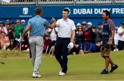 8 July 2018; Raphaël Jacquelin of France congratulates Russell Knox of Scotland after he birdied the 18th hole to earn a play-off on Day Four of the Dubai Duty Free Irish Open Golf Championship at Ballyliffin Golf Club in Ballyliffin, Co. Donegal. Photo by John Dickson/Sportsfile