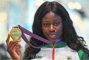 9 July 2018; Ireland's Rhasidat Adeleke, Tallaght AC, Dublin, with her gold medal for winning the Girls 200m event, during the Team Ireland homecoming from the European Athletics Under-18 Championships in Gyor, Hungary, at Dublin Airport in Dublin. Photo by Piaras Ó Mídheach/Sportsfile