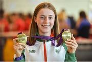 9 July 2018; Ireland's Sarah Healy, Blackrock AC, Dublin, with her gold medals for winning the Girls 1500m and 3000m events, during the Team Ireland homecoming from the European Athletics Under-18 Championships in Gyor, Hungary, at Dublin Airport in Dublin. Photo by Piaras Ó Mídheach/Sportsfile